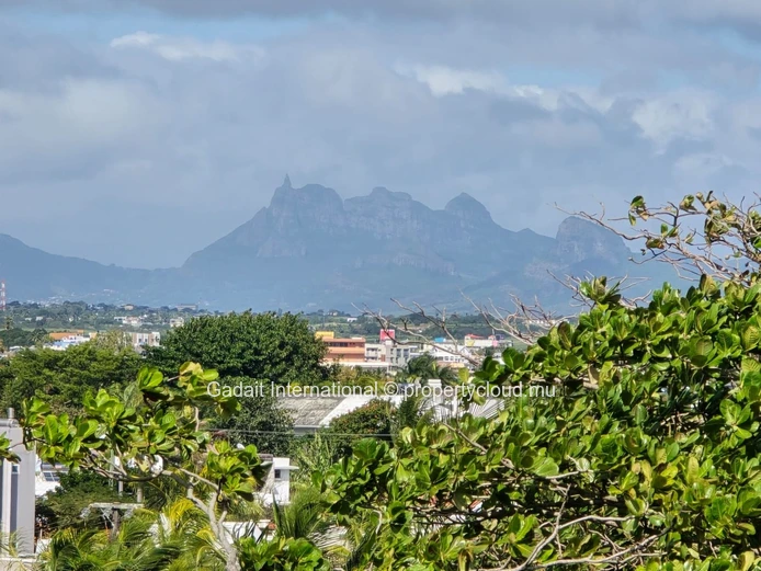 Penthouse d'exception avec rooftop privé à Pereybere – Vue mer & montagne