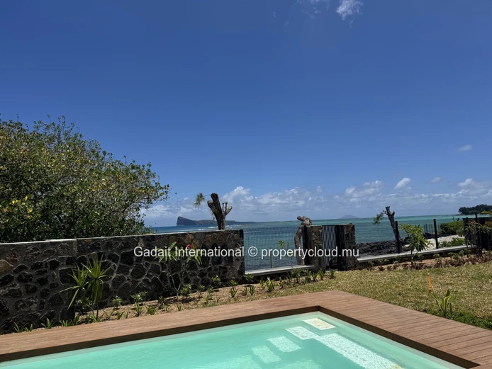 Villa pieds dans l'eau à louer – Pointe d'Azur, vue panoramique Coin de Mire & Îles du Nord