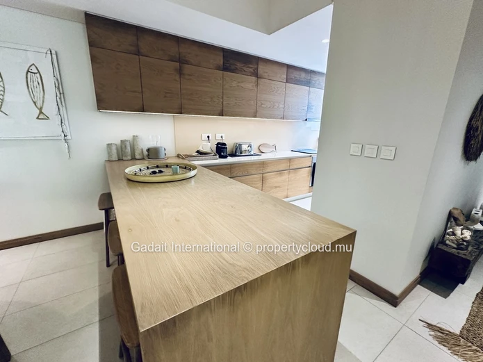 Appartement de Prestige à Montchoisy – Luxe, Sérénité et Accès Direct à la Plage
