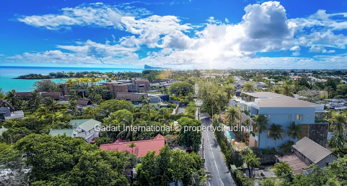 Appartement de Prestige avec Jardin & Piscine Privée – Résidence Boutique Royal Merville