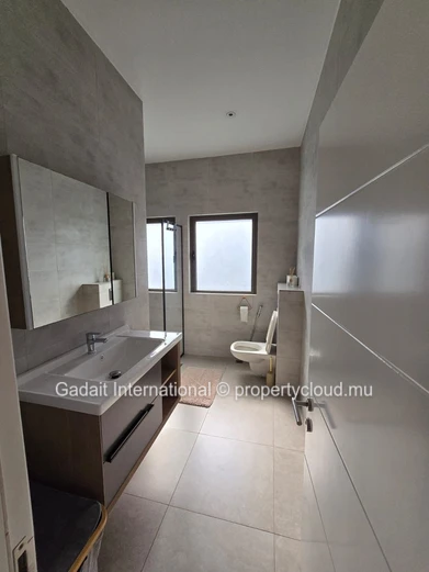 Penthouse d'exception avec rooftop privé à Pereybere – Vue mer & montagne